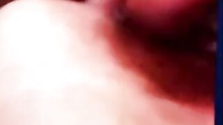 Fucking herself with a dildo