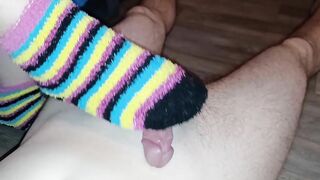 Cumming on her warm, fluffy rainbow socks - Jake & Cassandra