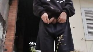 Master peeing in backyard, abandoned house