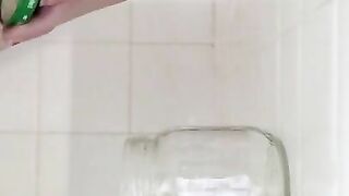 Milf pissing into jar