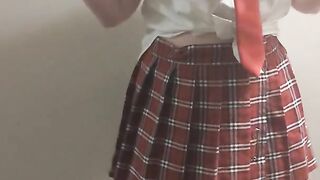 Amateur Stripping and Teasing School Uniform while Wearing an Anal Plug