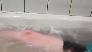 lie in the bathroom and play with your tits