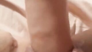 MILF fucks herself with a dildo